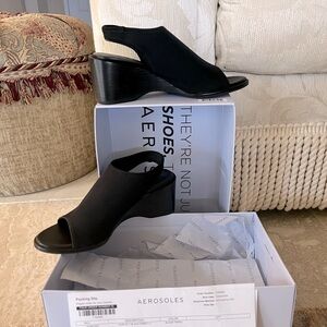 Size 7 med
Aerosoles black fabric wedges